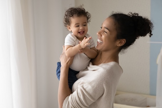 Father and daughter happily playing.